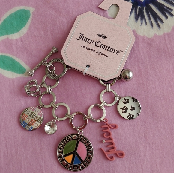 Juicy Couture Jewelry - Juicy Couture silver charm bracelet peace crown
